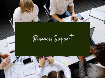 The words "Business Support" with an image of people sitting and working on computers in the background.